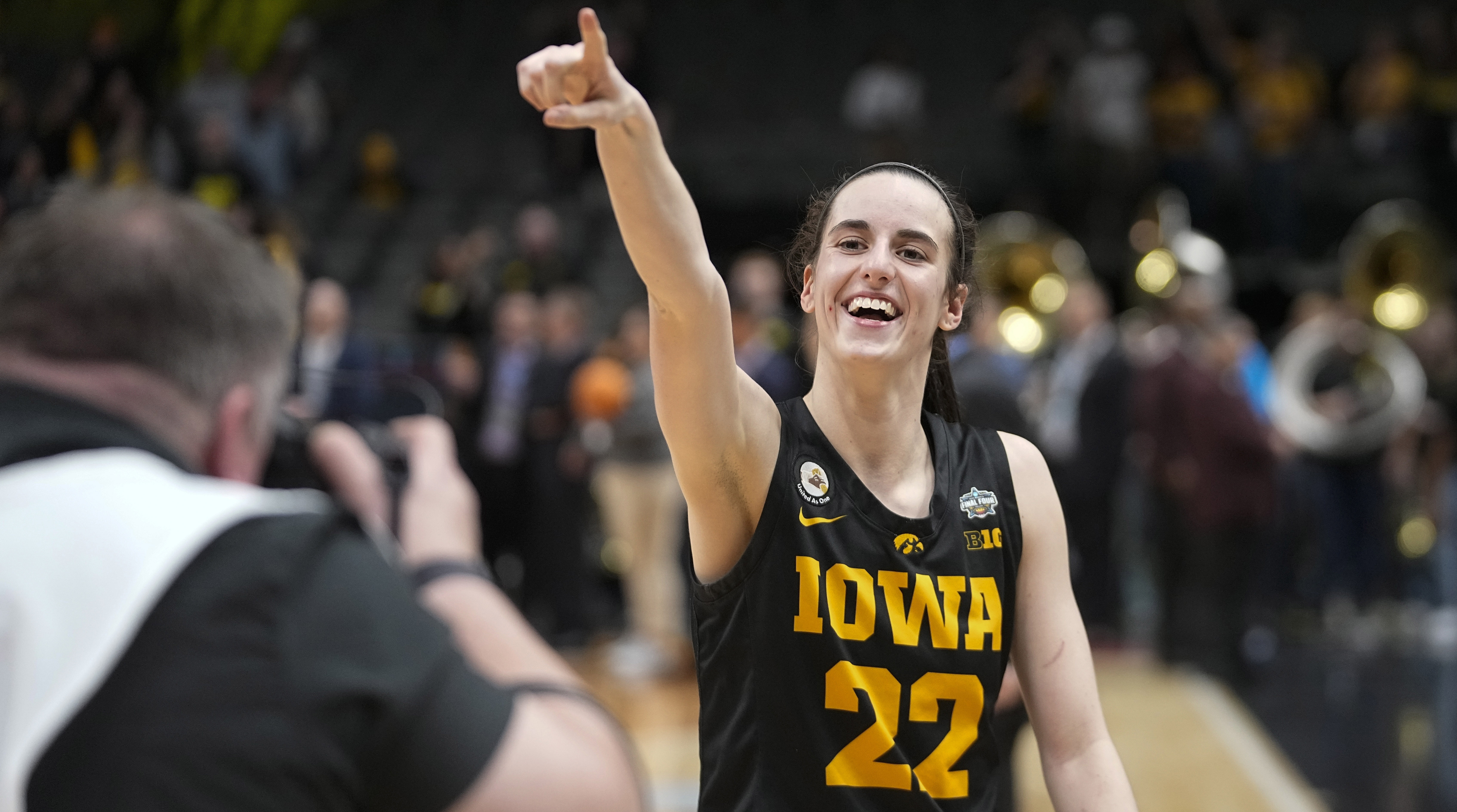 owa's Caitlin Clark celebrates after beating South Carolina in the Final Four.